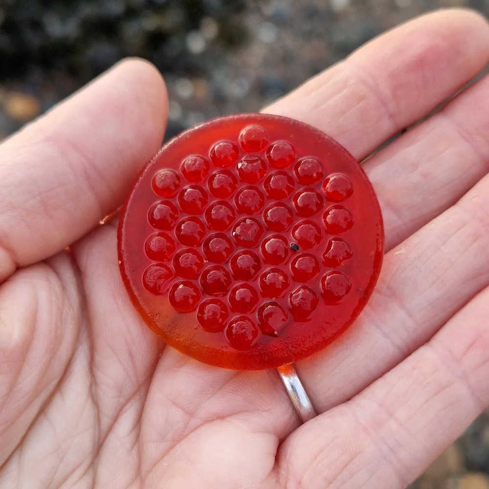 Beachcombing find: 01 Red Hobnail Lens