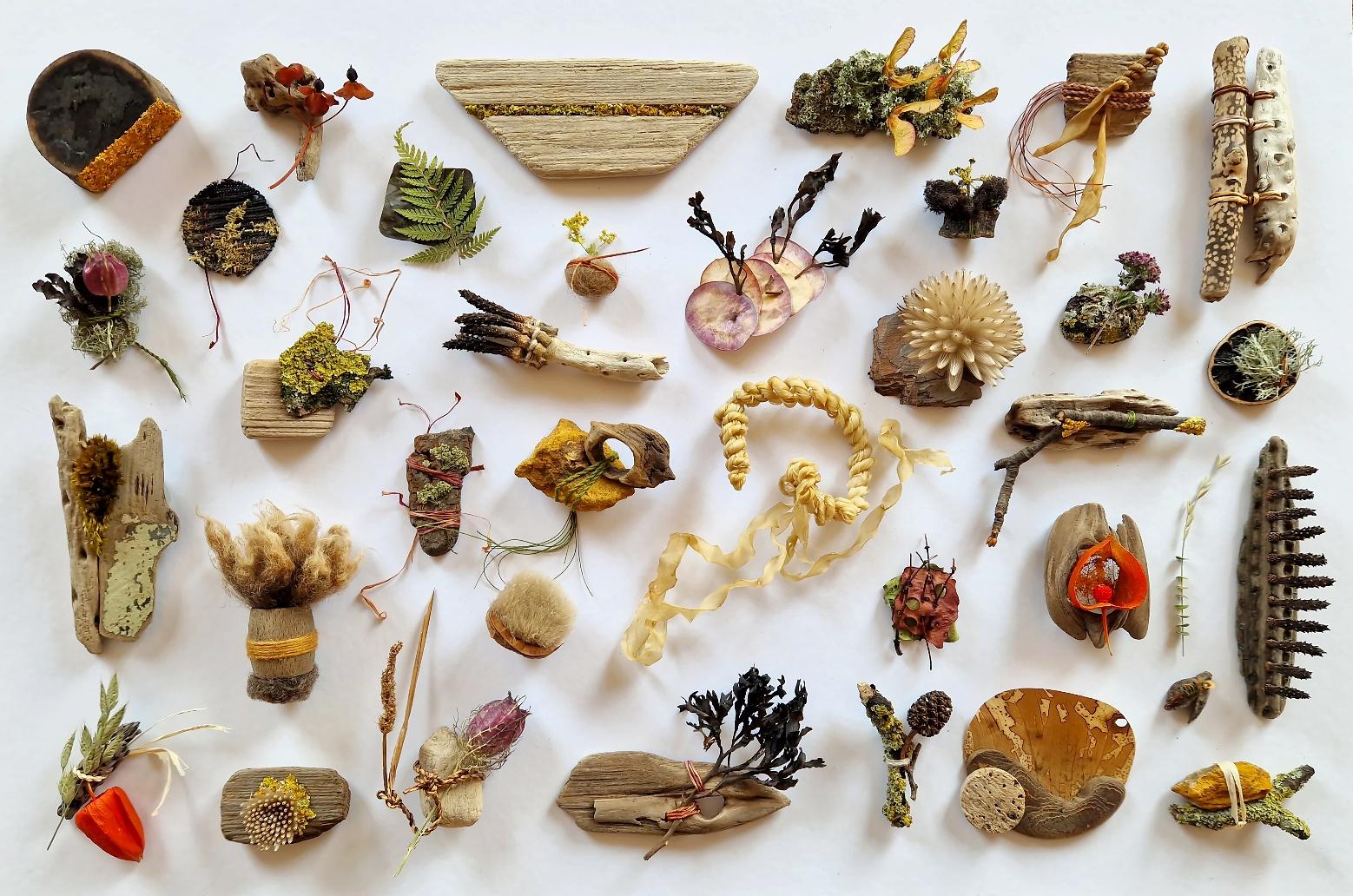 Small moss forms made from gathered natural materials